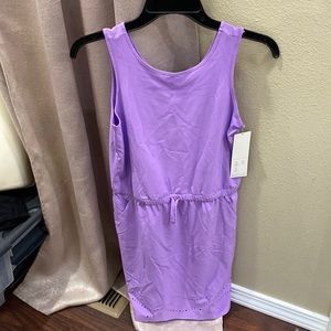 New with tags. Target brand All in Motion girls dress. Girls size L or 10-12.